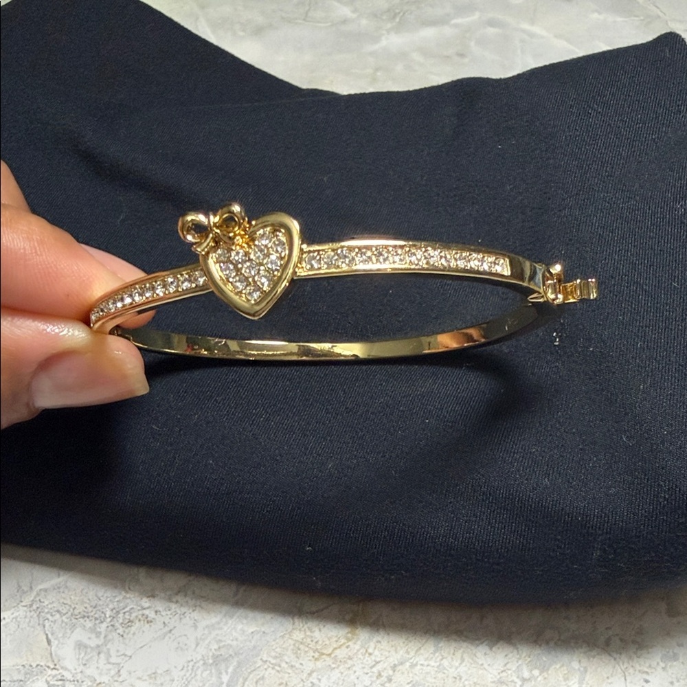 Gold Heart Bangle Bracelet platinum gold and cubic zirconia.